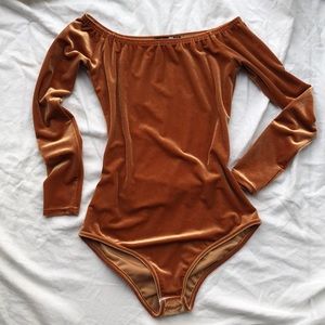 Orange Velvet Off-the-Shoulder Bodysuit.